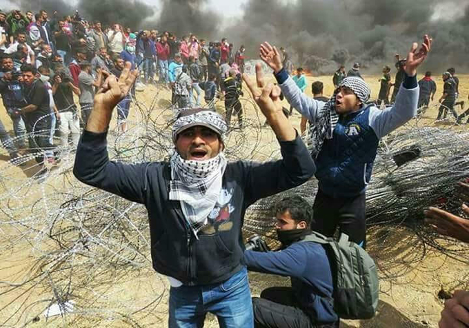 شهيد و968 إصابة بمسيرة العودة الكبرى في غزة
